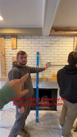 Custom built mantle and TV enclosure