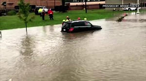 WATER RESCUE: Brodie Foster shot this video on Spartanburg Highway in Hendersonville today, as rescuers got the occupants of this SUV out safely. | Fox Carolina News