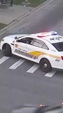 Hero cop saves choking woman on roadside in dramatic rescue