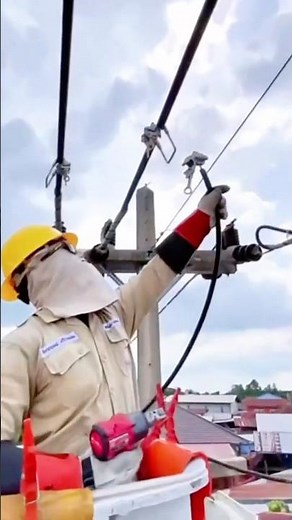 Power workers performing live-line work.#respect #amazing #hardwork