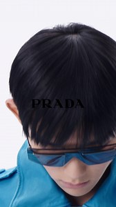 A futuristic inspiration shapes the new Prada Runway sunglasses playing with wide lenses and mirrored effect. | Prada