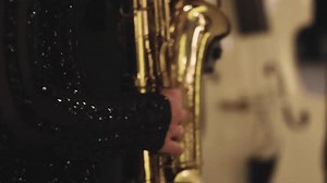 clip-3698289285-concert-view-female-saxophonist-musician-saxophone-sax
