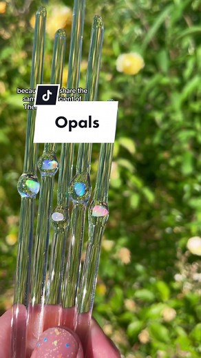 Encasing opals in glass and making glass chain necklaces. #glasstok #crafting #flameworkingstudio #opals