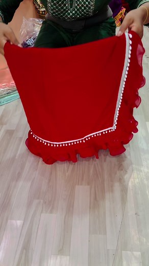 Traditional Red Embroidered Garment Showcase