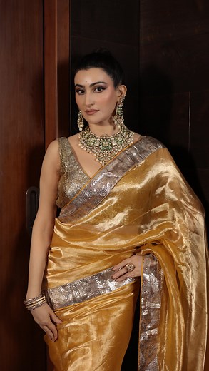 Shalini Passi on Instagram: "Shalini Passi dazzles and totally enthrals in this custom-made Pranay Baidya Saree recreating the distinctive drape and saree style of painter Amrita Sher-Gil. The ensemble brings together lustrous handwoven mulberry silk tissue Banarasi and pure lampi gota creating a look that is high on metallic sheen and 1920’s drama. 🤎🤎🤎🤎🤎🤎🤎🤎 Outfit: @pranay_baidya HMU: @mahisardana_ @sonuhairartist Jewellery: @sunit