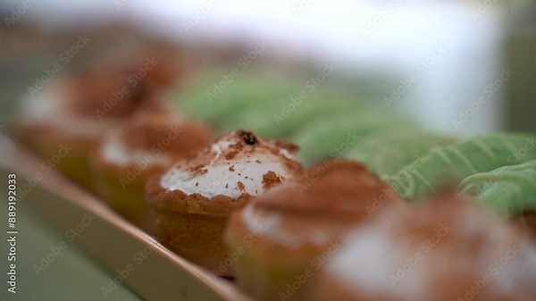 candy bar in an event location. Delicious wedding reception. Candy bar for banquet. Celebration concept. Trendy desserts. Table with sweets, candies. 4k video.