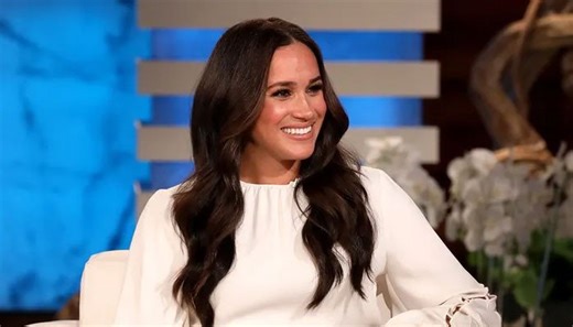 Photo: Meghan Markle shares rare photograph of Archie feeding rescue chickens