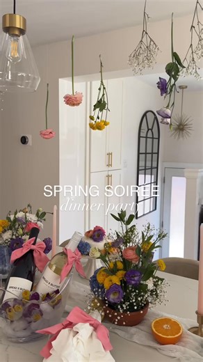 If spring threw a party, THIS would be it 🌸🥂 Bloom & gather at this spring soirée filled with colorful flowers, good food, wine & company 🥂🌼 Comment SPRING for an editable invitation & menu, details on everything I used and recipes ✨ Hosting shouldn’t be complicated! Stick to a theme, make tried-and-true recipes and serve wines you know will impress! #ad21 @breadandbutterwines makes easy drinking, approachable and delicious wines🍷 I am serving up their Pinot Grigio & Pinot Noir for some var