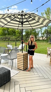 Sarah & Dan | DIY & Design on Instagram: "DIY ROLLING UMBRELLA STAND✨ Game changer! I’ve always loved a good umbrella stand but realized quickly that I would like one that can MOVE anywhere! We added modern cedar accents, hidden casters and created this umbrella stand to have a seamless look & design. We thought this would be a practical solution & we are thrilled with the results, plus it’s beautiful! Comment “plans” to get the FREE rolling umbrella stand plans sent to your inbox!"