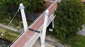 17K views · 367 reactions | Utrecht’s Dafne Schippers Bridge follows in the Dutch tradition of working together to find space-efficient design solutions. An elementary school acts as the on-ramp to a newly-built bike crossing of the Rijn Canal, complete with cycle path on the roof! https://vimeo.com/292657475 | Dutch Cycling Embassy | Facebook