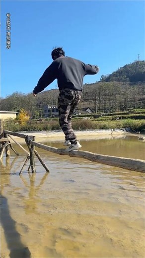 Water obstacle course on a single-plank bridge #OutdoorAdventures #PopularityIncentiveProgram