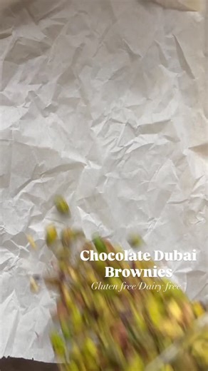 JADE / Wholefoods recipes on Instagram: "A decade of GF, DF baking and these Chocolate Dubai Brownies are IT. An incredible MOIST chocolate tahini brownie topped with from-scratch Dubai pistachio filling and topped with silky smooth choccy 🤤. But hey, let’s make it free from dairy, gluten, grains, refined sugar and YES these can be vegan too (use flax eggs to make the brownies egg free). Made in collaboration with @partandparcel.store , using the worlds best baking drops @locolovechocolate 👏. 