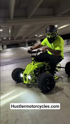 Custom built quad in action. Drifting down the hallway/parking space