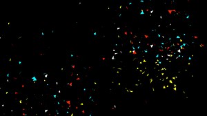 Download colorful particle Confetti explosion animation on a black background for free
