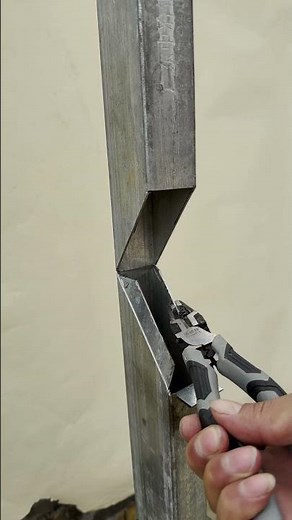 Metal Structure Assembly Steps: Adjusting with Pliers for Welding Preparation