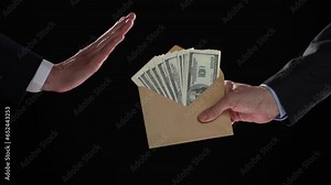 Businessman refusing money in the envelope - anti bribery and corruption concepts