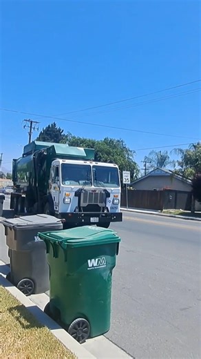 Waste Management Peterbilt 520 Amrep Side Loader on Yard Waste