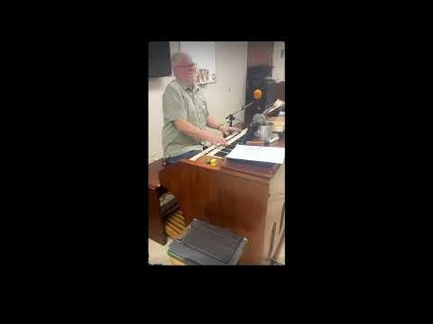 Me checking out an organ (Hammond D-152) after servicing.