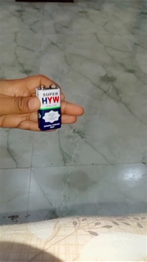 how to glow a bulb with the help of battery and connector.#bulb #craft.