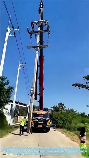 Steel Muscle Overhead: The Aerial Precision of Setting a Utility Pole