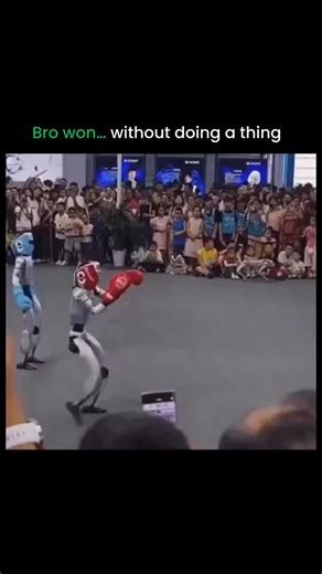 Artificial Intelligence (Ai) •Technology • Robotics | The funniest robot boxing match you’ll ever see. 🥊💀 In a crowded ring, two robots geared up with boxing gloves and helmets went... | Instagram