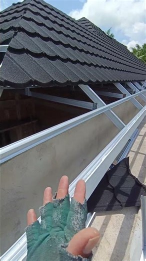 the process of installing a pyramid-shaped sand metal roof