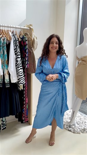 KLEIO BOUTIQUE on Instagram: "✨ Wrap yourself in elegance ✨ This stunning sky-blue wrap dress is the ultimate day-to-night piece. Soft satin texture, subtle leopard print, and a flattering silhouette. Shop Vienna Jacquard Dress in store or online 💙"