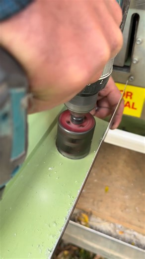 In a previous video, I had a lot of questions, on how this outlet punch works. Here’s a more detailed video. This is a 5” gutter with 3x4 downs. Step 1 drill a 2 1/8” hole Step 2 set the punch Step 3 remove the perfect cutout. | East River Builders