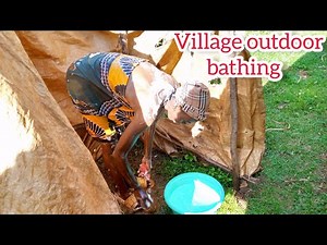 African village life//Bathing in an Outdoor bathroom.