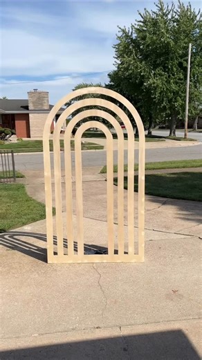 Lawrence | Marquee Numbers | Party Props | Woodworker 🪵 on Instagram: "DIY rainbow arch. Here is another way you can achieve the straight lines in the rainbow arch if you don’t have a track saw. You can use a straight edge with a few screws to secure it and use your circular saw to make your cuts. It takes a little time, but it’s achievable. #lowespartner #woodbackdrops #rainbowarchbackdrop #diybackdrop #eventprops"