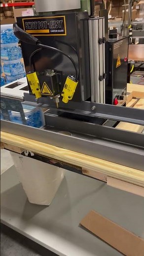 Wrap around carton gluing with semi automatic hot melt system and hot melt adhesive