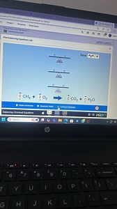 The image shows a screenshot of a Phet simulation for balancing... | Filo