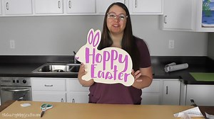 Hop into Easter with a DIY Bunny Sign!  Learn how to create a design around a specific shape! https://thecraftyblogstalker.com/diy-hoppy-easter-sign-tutorial/ | The Crafty Blog Stalker | Facebook