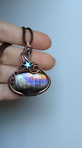 1K views · 296 reactions | This Labradorite is so beautiful! It showed the colors best when positioned horizontally. That's the thing with Labradorites, they tell you how they need to be wrapped based on how they show their colors best. #labradorite #labradoritejewelry #wirewrappedpendant #wirewrap | OxanaCrafts | Facebook