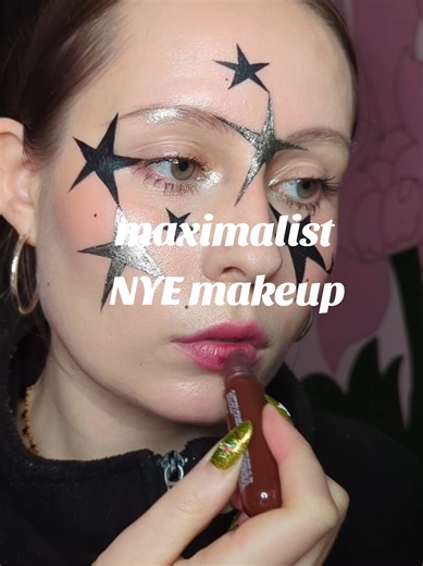 NYE makeup inspo for the fun girls with no fear 🌟⭐✨ #newyearmakeup #makeupinspo #creativemakeup #editorialmakeup new year's eve makeup ideas, black and silver makeup inspo, creative makeup look, editorial makeup, star makeup, graphic liner, indie makeup, maximalist