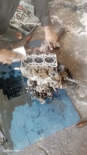 Suzuki car engine cleaning in process