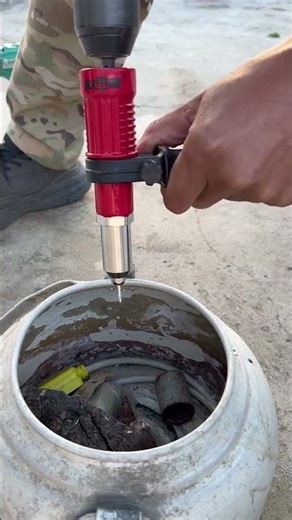 Hand drill to rivet gun conversion head