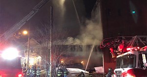 Three alarm fire sends smoke miles overnight