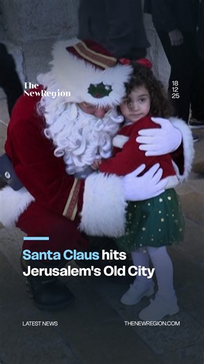 The New Region on Instagram: "Palestinian basketball coach Issa Kassissieh strolls through Jerusalem dressed as Santa Claus, distributing Christmas trees and greeting children."