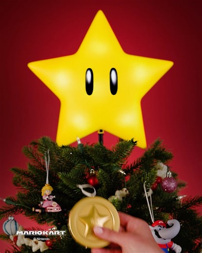 Level up your Christmas decor with new finds from Mario and friends! 💫 The Super Star Tree Topper performs a synchronized light show to music from Super Mario Bros., and the remote doubles as an ornament. Princess Peach and Elephant Mario are here, too. The best part? The ornaments and topper are available NOW. Wahoo!️ 🎄 Shop now: https://bit.ly/42UJrvJ | Hallmark Keepsake Ornaments