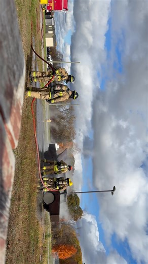 An all female attack crew of recruits. FF Sarah (Merrickville Fire Department), FF Cassidy (Township of Athens Fire Department) and FF Amy (Leeds 1000 Islands Fire) attack a simulated vehicle fire while a couple of their fellow students position hose for them. Great job ladies! | Leeds 1000 Islands Fire Services