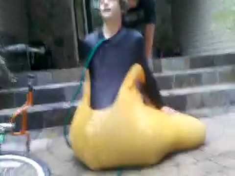 Kid in wetsuit full of water Inflation