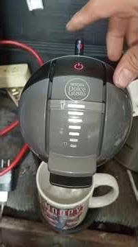 My Dolce Gusto Mini coffee machine is flashing a green and red light.