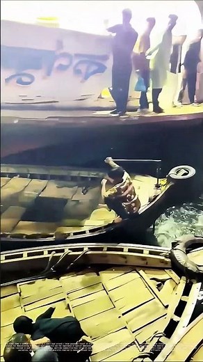 Navigating Tight Waters: How a Small Boat Maneuvers Around a Giant Vessel