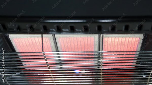 Hot gas in a ceramic element of a gas heater, top view. Cooling and heating the room without light