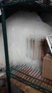 walk in freezer frozen drain line causing the water to spill onto the floor causing large ice build