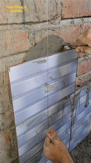 I put a tile on the wall and measured it with a string to see if the tile was straight.#walltiles