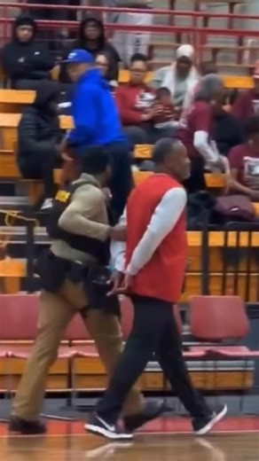 Unreal situation in college basketball as Tuskegee coach Benjy Taylor was escorted off the court in handcuffs after a loss to rival Morehouse #cbb | Michael Bassano