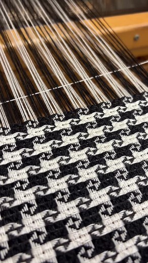 weaving the houndstooth collection at @pinkdogcreative 🖤 these handwoven scarves are off the loom and hanging in my studio. Try one on during RADFest this weekend, or DM me for info! #handweaving #textileartist #ashevilleartist | Lunadendron