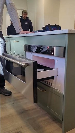 Demonstrating a drawer microwave oven in the IKEA kitchen we recently installed in Virginia Beach,VA